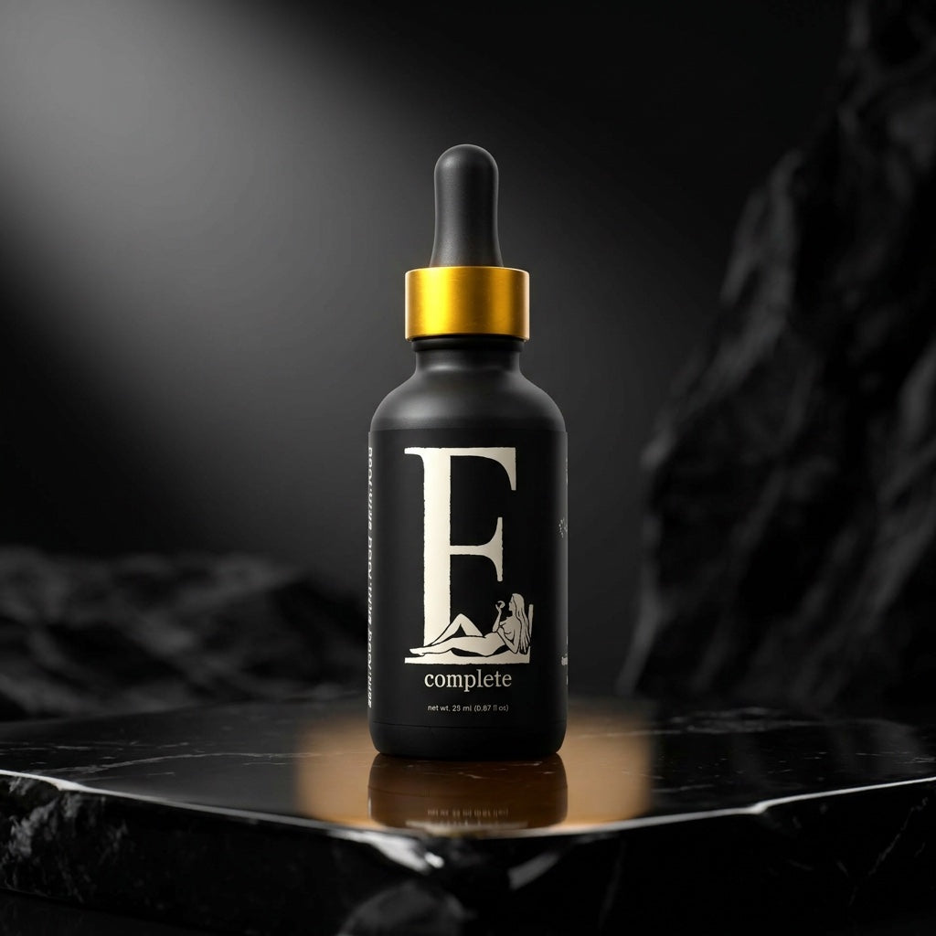 E Complete bottle on black stone with amber highlights